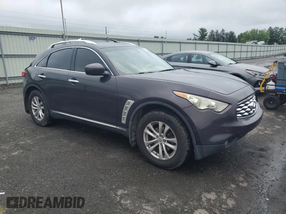 2011 Infiniti FX with VIN JN8AS1MW0BM142156, listed as a Copart auction lot 60468945 with Not provided miles and Salvage title. Bid and sale history available at DreamBid. Image 4.