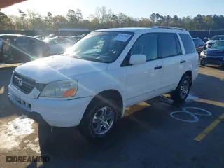 2004 Honda Pilot EX with VIN 2HKYF18564H571427, listed as a IAAI auction lot 41867906 with 359,577 mi miles. Bid and sale history available at carsss.com. Image 2.