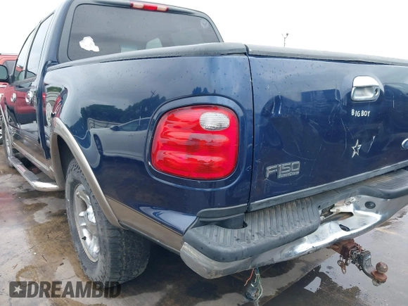 2003 Ford F-150 XLT with VIN 1FTRW07L33KC83234, listed as a IAAI auction lot 41894573 with 215,232 mi miles. Bid and sale history available at carsss.com. Image 18.