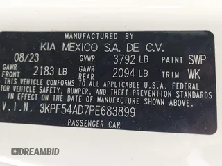 2023 Kia Forte GT-Line z VIN 3KPF54AD7PE683899, wystawiony jako IAAI lot #41902601 z przebiegiem 13 859 mil mil oraz . Historia ofert i sprzedaży dostępna na DreamBid. Obrazek 9.