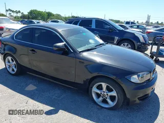 2011 BMW 1 Series 128i with VIN WBAUP7C55BVK78344, listed as a IAAI auction lot 41776367 with 138,351 mi miles. Bid and sale history available at carsss.com. Image 1.