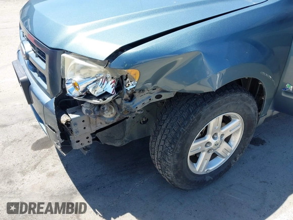 2011 Ford Escape Hybrid with VIN 1FMCU4K30BKC54584, listed as a IAAI auction lot 42131257 with 107,905 mi miles and . Bid and sale history available at DreamBid. Image 6.