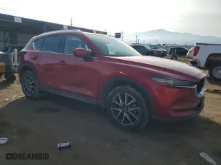 2018 Mazda CX-5 Grand Touring with VIN JM3KFBDM3J0375051, listed as a Copart auction lot 45989125 with 77,147 mi miles and Salvage Title. Bid and sale history available at carsss.com. Image 4.