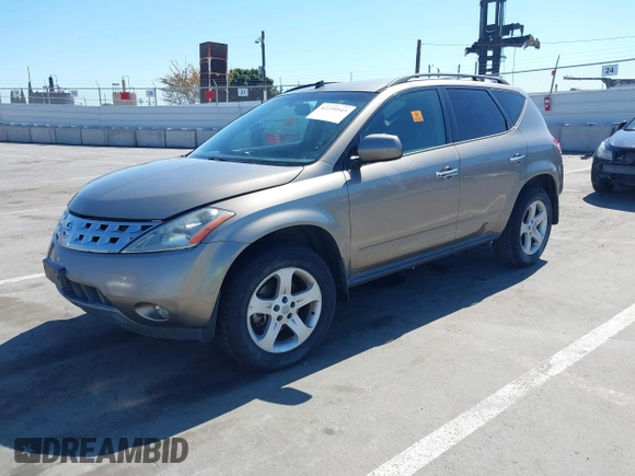 2004 Nissan Murano SL z VIN JN8AZ08T94W204232, wystawiony jako IAAI lot #42239543 z przebiegiem Nie podano mil oraz . Historia ofert i sprzedaży dostępna na DreamBid. Obrazek 16.