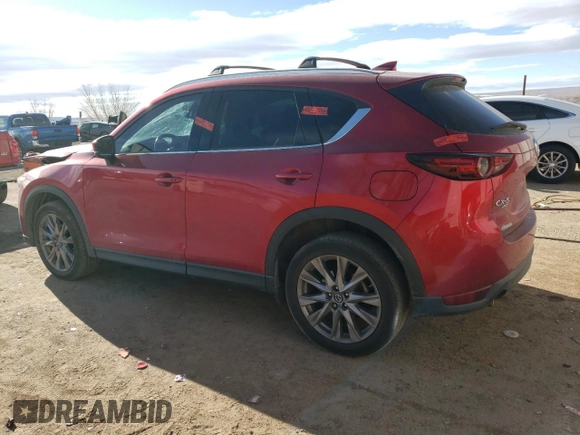 2020 Mazda CX-5 Grand Touring with VIN JM3KFBDM9L1820907, listed as a Copart auction lot 86166054 with 34,007 mi miles and Salvage Title. Bid and sale history available at carsss.com. Image 2.