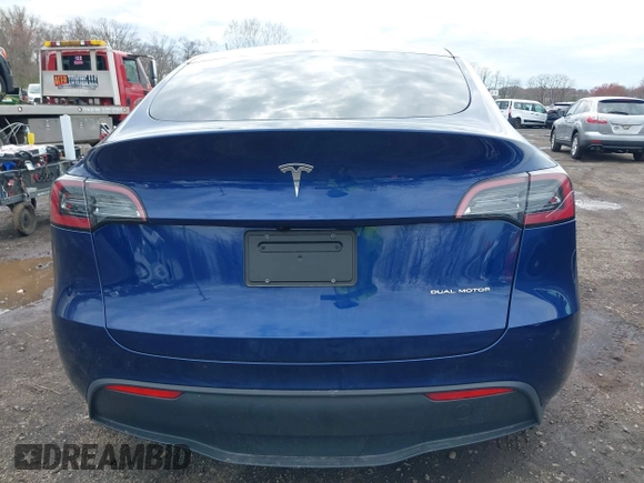 2023 Tesla Model Y Long Range with VIN 7SAYGDEE4PF891709, listed as a IAAI auction lot 41944893 with 15,864 mi miles. Bid and sale history available at carsss.com. Image 16.