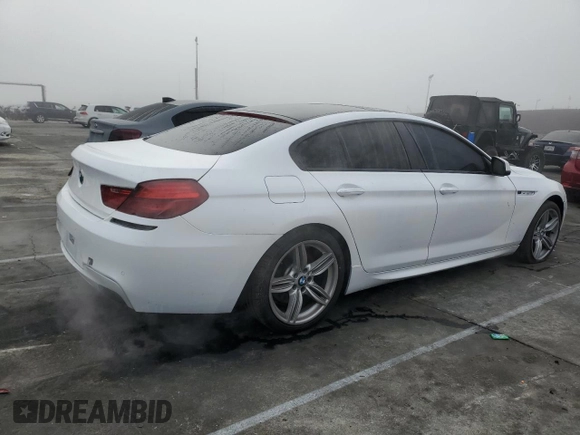2014 BMW 6 Series 650i z VIN WBA6B2C59ED128936, wystawiony jako Copart lot #46409685 z przebiegiem 53 208 mil mil oraz Szkoda całkowita • Salvage title. Historia ofert i sprzedaży dostępna na DreamBid. Obrazek 3.