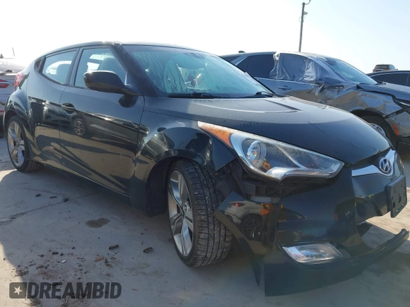 2013 Hyundai Veloster w/Black Int with VIN KMHTC6AD2DU171044, listed as a IAAI auction lot 42245907 with 140,542 mi miles and . Bid and sale history available at DreamBid. Image 1.