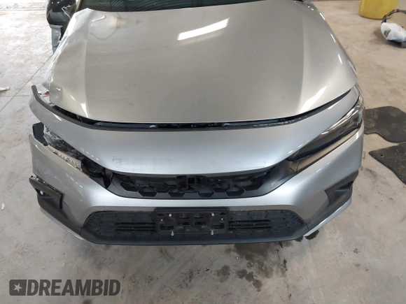 2023 Honda Civic Sport with VIN 19XFL2H80PE010679, listed as a IAAI auction lot 42026973 with 25,701 mi miles and . Bid and sale history available at DreamBid. Image 12.