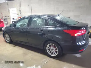 2017 Ford Focus SE with VIN 1FADP3F23HL244667, listed as a Copart auction lot 57597125 with 166,730 mi miles and Salvage title. Bid and sale history available at DreamBid. Image 2.