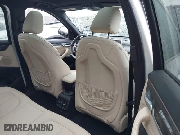 2017 BMW X1 xDrive28i with VIN WBXHT3C36H5F74818, listed as a IAAI auction lot 41853836 with 71,735 mi miles and . Bid and sale history available at DreamBid. Image 8.