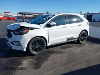 2020 Ford Edge SEL z VIN 2FMPK3J92LBB53467, wystawiony jako IAAI lot #41241115 z przebiegiem 58 183 mil mil oraz . Historia ofert i sprzedaży dostępna na DreamBid. Obrazek 18.