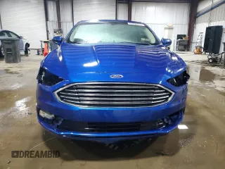 2018 Ford Fusion Titanium с VIN 3FA6P0D90JR159218, выставлен на аукционе Copart как лот 63766945 с пробегом 115 529 миль миль и Списание • Salvage title. История ставок и продаж доступна на DreamBid. Изображение 5.
