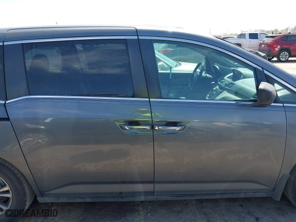 2012 Honda Odyssey EX-L with VIN 5FNRL5H64CB131197, listed as a IAAI auction lot 41829107 with 215,115 mi miles. Bid and sale history available at carsss.com. Image 14.