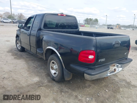 2000 Ford F-150 XL with VIN 1FTZX0725YKA09559, listed as a IAAI auction lot 41810954 with Not provided miles and . Bid and sale history available at DreamBid. Image 3.