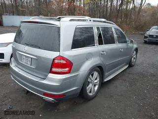 2011 Mercedes-Benz GL-Class GL 450 with VIN 4JGBF7BE8BA676097, listed as a IAAI auction lot 41881075 with 27,137 mi miles. Bid and sale history available at carsss.com. Image 4.