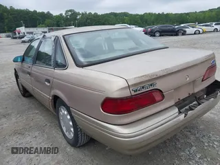 1993 Ford Taurus with VIN 1FALP5343PA153390, listed as a IAAI auction lot 42559003 with 64,617 mi miles and . Bid and sale history available at DreamBid. Image 3.