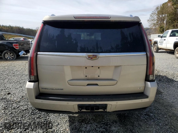 2015 Cadillac Escalade ESV Platinum z VIN 1GYS4UKJ7FR609546, wystawiony jako Copart lot #77941594 z przebiegiem 168 117 mil mil oraz Czysty tytuł • Clean title. Historia ofert i sprzedaży dostępna na DreamBid. Obrazek 6.