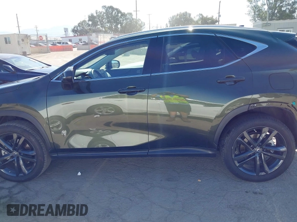 2023 Lexus NX 450h+ Luxury with VIN JTJHKCFZ0P2017929, listed as a IAAI auction lot 42282635 with 18,611 mi miles and . Bid and sale history available at DreamBid. Image 15.