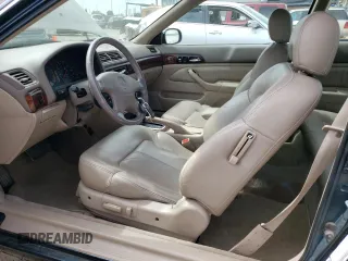 1998 Acura CL Premium z VIN 19UYA2259WL000799, wystawiony jako Copart lot #71822214 z przebiegiem 92 399 mil mil oraz Tytuł czysty. Historia ofert i sprzedaży dostępna na DreamBid. Obrazek 7.