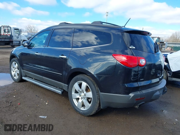 2011 Chevrolet Traverse LTZ with VIN 1GNKVLED5BJ197551, listed as a IAAI auction lot 41800519 with 205,771 mi miles and . Bid and sale history available at DreamBid. Image 3.