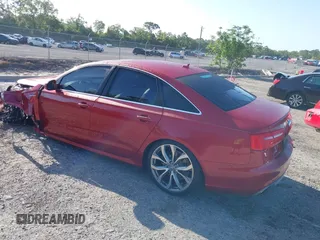 2014 Audi A6 Prestige with VIN WAUHGAFC6EN060054, listed as a IAAI auction lot 42006061 with 42,381 mi miles and . Bid and sale history available at DreamBid. Image 3.