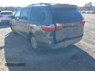 2016 Toyota Sienna XLE with VIN 5TDYK3DCXGS706385, listed as a IAAI auction lot 41286243 with 138,553 mi miles. Bid and sale history available at carsss.com. Image 3.