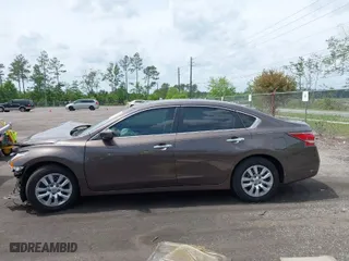 2014 Nissan Altima 2.5 with VIN 1N4AL3AP3EC100145, listed as a IAAI auction lot 41978710 with 185,401 mi miles. Bid and sale history available at carsss.com. Image 15.
