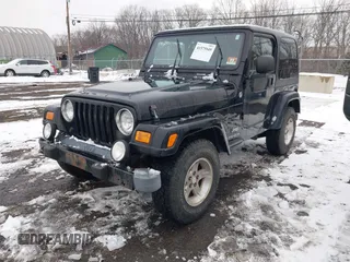 2005 Jeep Wrangler X with VIN 1J4FA39S55P353131, listed as a IAAI auction lot 41575949 with 154,026 mi miles and . Bid and sale history available at DreamBid. Image 17.