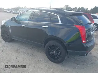 2014 Cadillac SRX z VIN 3GYFNAE35ES652370, wystawiony jako IAAI lot #40984924 z przebiegiem 211 588 mil mil oraz . Historia ofert i sprzedaży dostępna na DreamBid. Obrazek 3.
