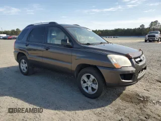 2009 Kia Sportage LX with VIN KNDJF724297573255, listed as a Copart auction lot 51300095 with 199,362 mi miles and Salvage Title. Bid and sale history available at carsss.com. Image 4.