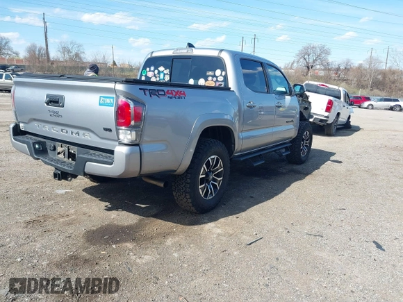 2020 Toyota Tacoma SR5 with VIN 3TMCZ5AN3LM320411, listed as a IAAI auction lot 41838498 with 50,252 mi miles and . Bid and sale history available at DreamBid. Image 4.