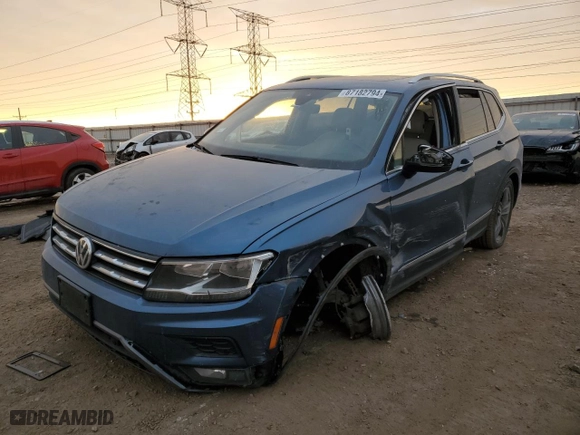 2020 Volkswagen Tiguan SE with VIN 3VV2B7AXXLM181344, listed as a Copart auction lot 87182794 with 62,145 mi miles and Salvage Title. Bid and sale history available at carsss.com. Image 1.
