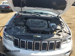 2020 Jeep Grand Cherokee Laredo E z VIN 1C4RJFAGXLC327107, wystawiony jako Copart lot #57259795 z przebiegiem 27 217 mil mil oraz Szkoda całkowita • Salvage title. Historia ofert i sprzedaży dostępna na DreamBid. Obrazek 11.
