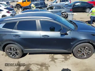 2023 Kia Sportage EX with VIN KNDPVCAG8P7019572, listed as a IAAI auction lot 42226335 with 68,583 mi miles and . Bid and sale history available at DreamBid. Image 14.