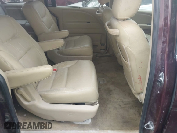 2010 Honda Odyssey EX with VIN 5FNRL3H45AB044845, listed as a IAAI auction lot 42353739 with 289,376 mi miles and . Bid and sale history available at DreamBid. Image 8.