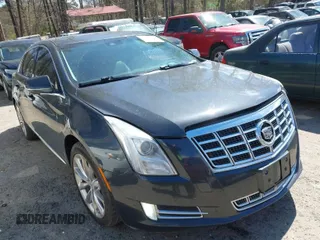 2013 Cadillac XTS Premium with VIN 2G61S5S33D9113653, listed as a IAAI auction lot 41837117 with 101,049 mi miles. Bid and sale history available at carsss.com. Image 1.