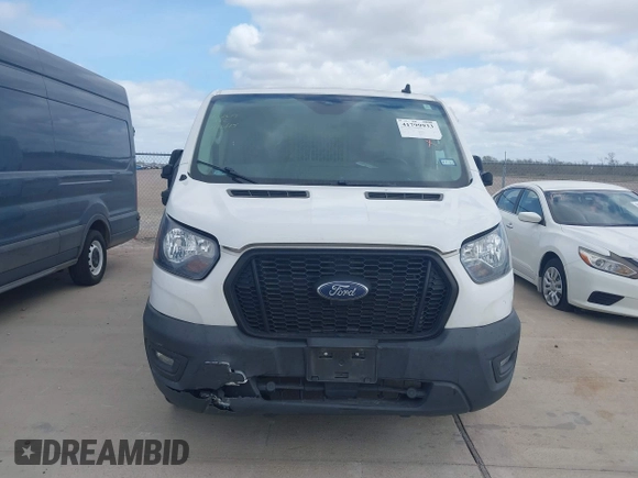 2021 Ford Transit Cargo with VIN 1FTBR1Y84MKA41093, listed as a IAAI auction lot 41799933 with 59,088 mi miles and . Bid and sale history available at DreamBid. Image 12.