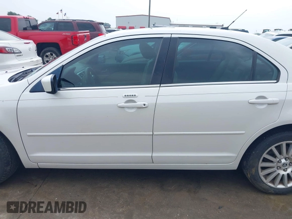 2009 Mercury Milan Premier z VIN 3MEHM08179R604905, wystawiony jako IAAI lot #42200193 z przebiegiem 130 771 mil mil oraz . Historia ofert i sprzedaży dostępna na DreamBid. Obrazek 14.