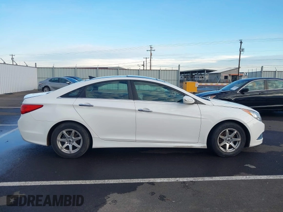 2014 Hyundai Sonata SE with VIN 5NPEC4AC5EH880717, listed as a IAAI auction lot 41275243 with 145,577 mi miles and . Bid and sale history available at DreamBid. Image 13.