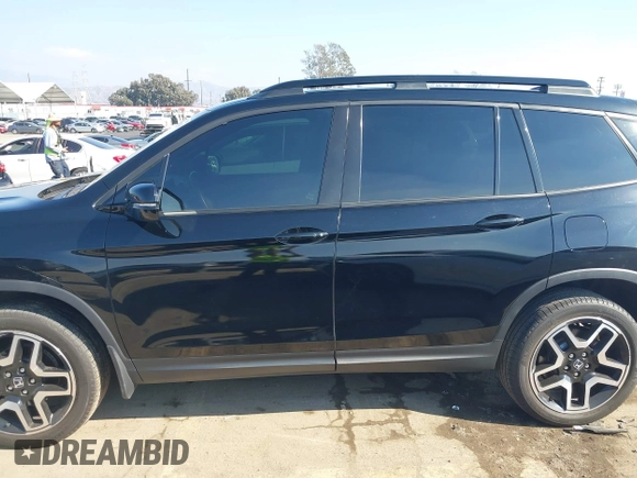 2023 Honda Passport Elite z VIN 5FNYF8H01PB005725, wystawiony jako IAAI lot #41457435 z przebiegiem 39 562 mil mil oraz . Historia ofert i sprzedaży dostępna na DreamBid. Obrazek 14.