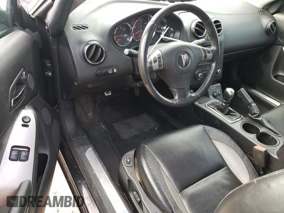 2006 Pontiac G6 GTP with VIN 1G2ZM151164136839, listed as a Copart auction lot 80688484 with 168,470 mi miles and Salvage Title. Bid and sale history available at carsss.com. Image 8.