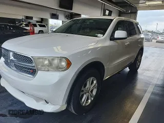 2013 Dodge Durango SXT with VIN 1C4RDJAG8DC671689, listed as a IAAI auction lot 42743958 with 160,950 mi miles and . Bid and sale history available at DreamBid. Image 16.