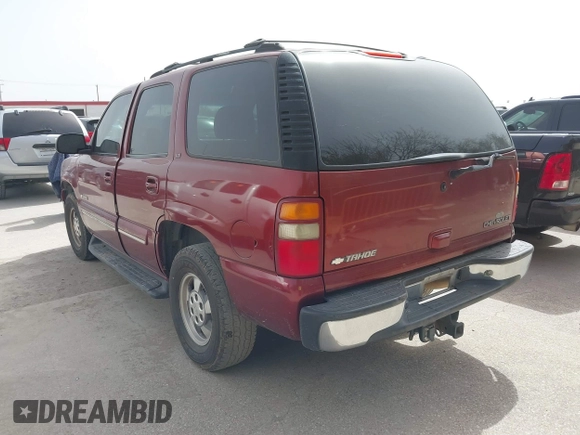 2003 Chevrolet Tahoe LS z VIN 1GNEC13Z93R107570, wystawiony jako IAAI lot #41809679 z przebiegiem 234 901 mil mil oraz . Historia ofert i sprzedaży dostępna na DreamBid. Obrazek 3.