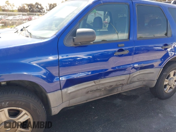 2005 Ford Escape XLS Value with VIN 1FMYU02Z85KD90338, listed as a IAAI auction lot 41916569 with 174,870 mi miles. Bid and sale history available at carsss.com. Image 12.