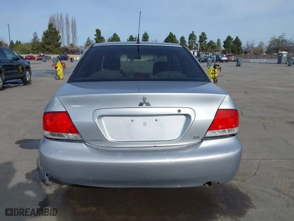 2004 Mitsubishi Lancer ES with VIN JA3AJ26E54U052124, listed as a IAAI auction lot 41804473 with 165,786 mi miles. Bid and sale history available at carsss.com. Image 17.
