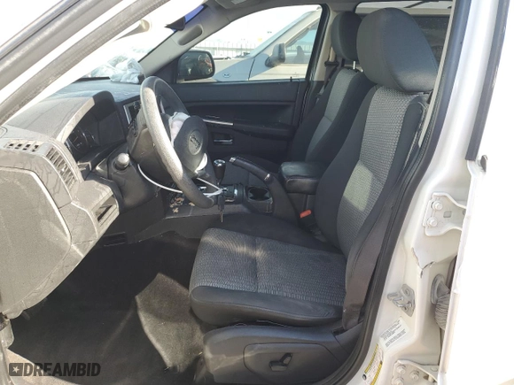 2009 Jeep Grand Cherokee Laredo with VIN 1J8GR48K39C539220, listed as a Copart auction lot 49711345 with 125,505 mi miles and Salvage Title. Bid and sale history available at carsss.com. Image 7.