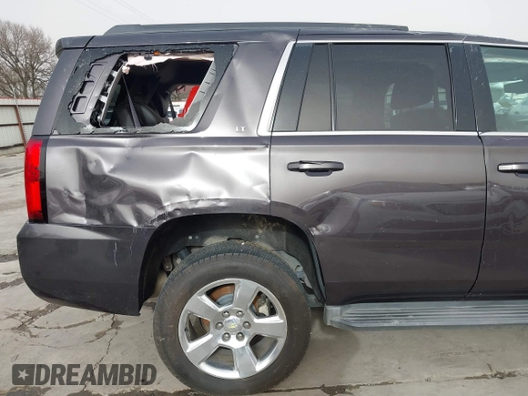 2015 Chevrolet Tahoe LT with VIN 1GNSCBKC5FR504459, listed as a IAAI auction lot 41689405 with 141,783 mi miles and . Bid and sale history available at DreamBid. Image 13.