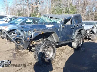 2007 Jeep Wrangler Rubicon with VIN 1J8GA64197L116283, listed as a IAAI auction lot 41008968 with 215,388 mi miles and . Bid and sale history available at DreamBid. Image 2.