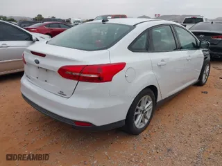 2016 Ford Focus SE with VIN 1FADP3F29GL379537, listed as a IAAI auction lot 41931420 with 107,436 mi miles. Bid and sale history available at carsss.com. Image 4.
